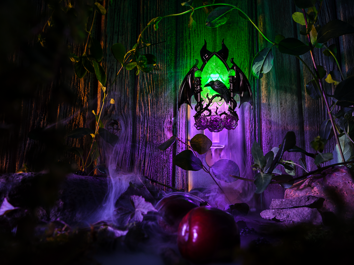 Wallflower plug in from the Bath & Body Works Disney Villains collection with branches, purple and green back lighting