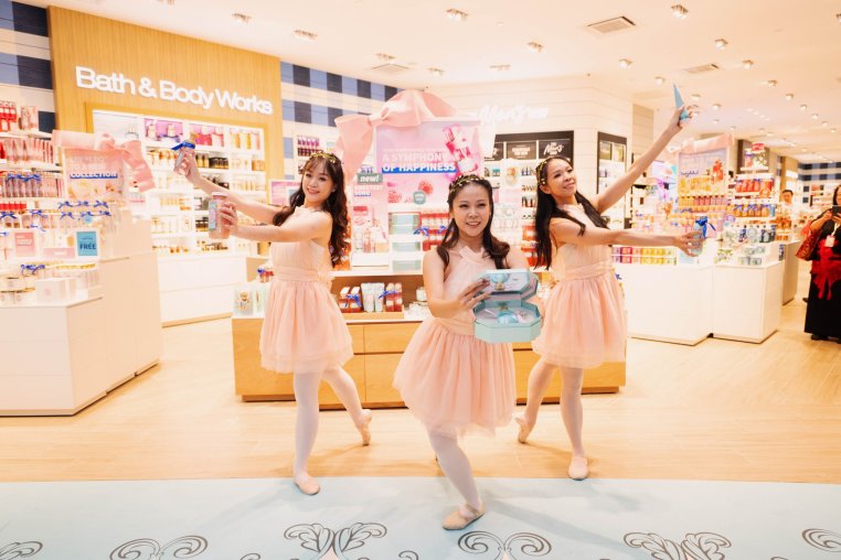 Attendees at a Bath & Body Works store grand opening event