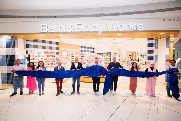 Attendees at a Bath & Body Works store grand opening event