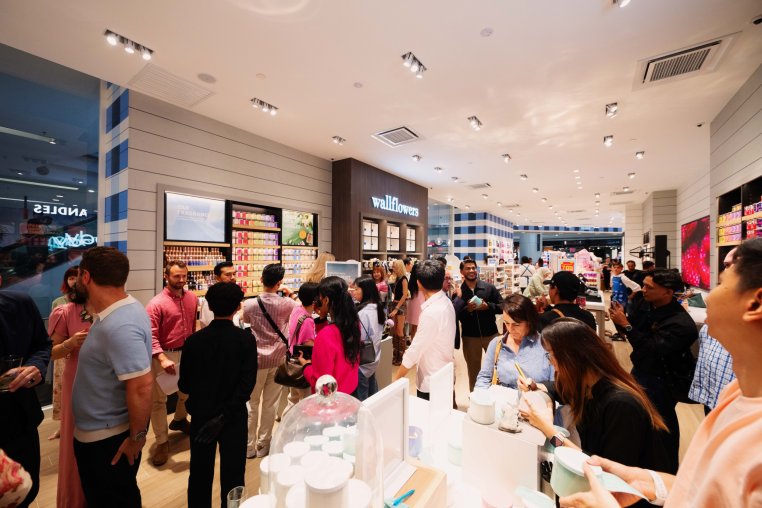 Attendees at a Bath & Body Works store grand opening event