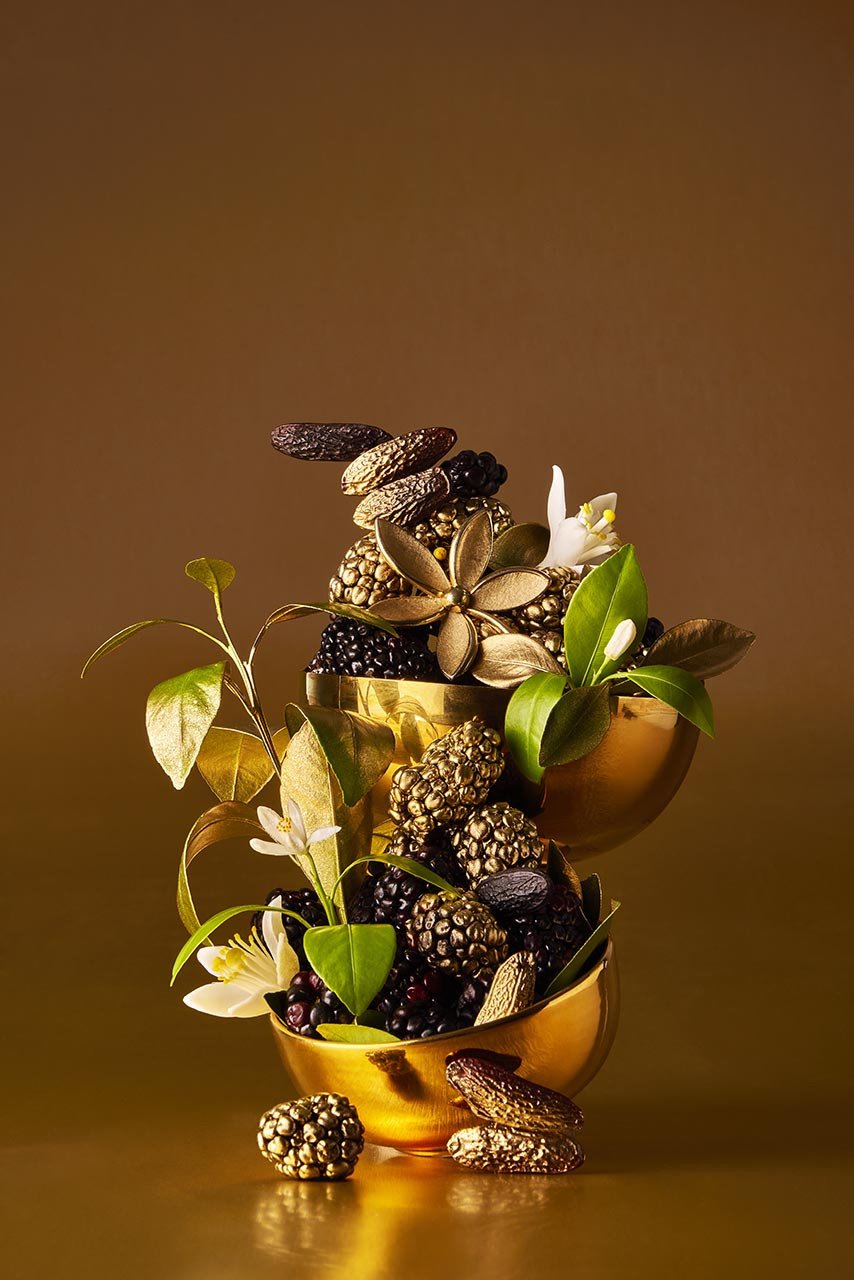 Photo of decorative floral assortment on a gold background