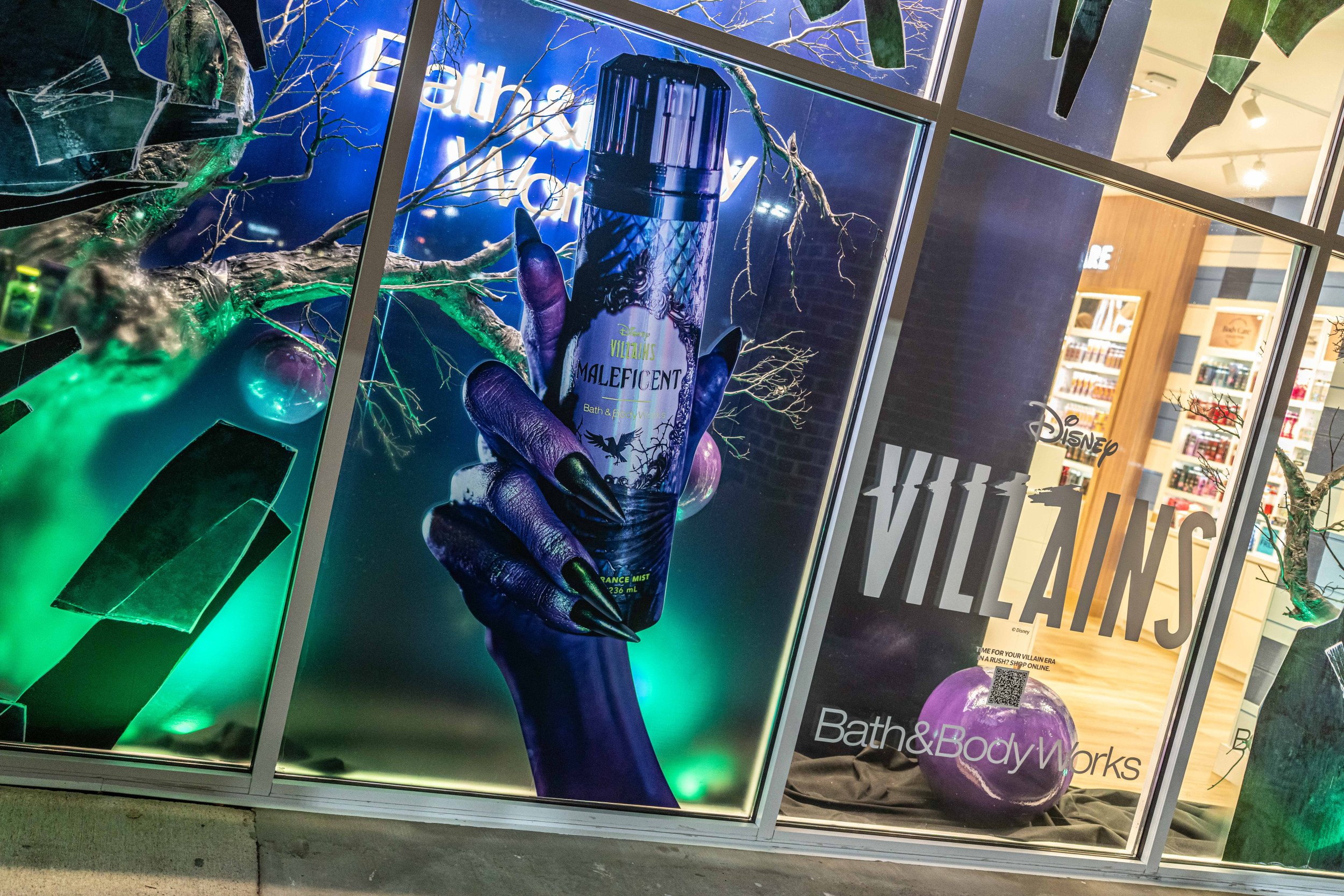 Photo of Bath & Body Works store windows with Disney Villains decor