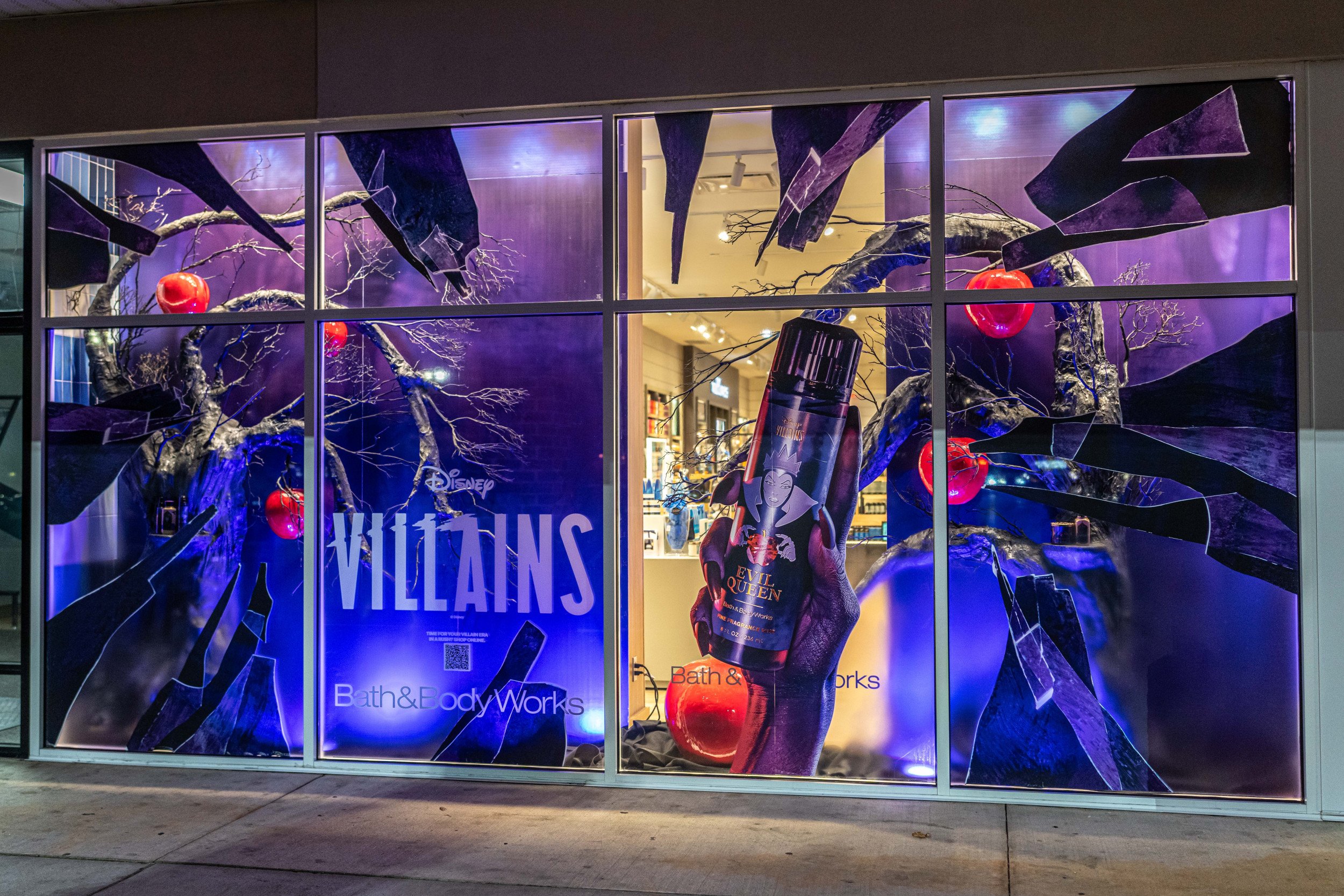 Photo of Bath & Body Works store windows with Disney Villains decor