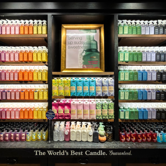 Wall with hand soap and hand sanitizer products in a Bath & Body Works store