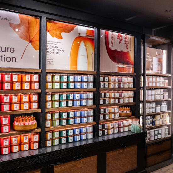 Fall 3-wick candle wall in a Bath & Body Works store