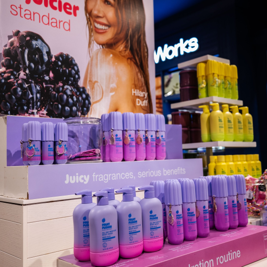 Fruit Fusion product stand with photo of Hilary Duff in a Bath & Body Works store