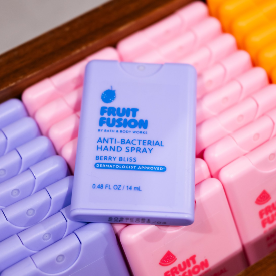 Close up photo of Fruit Fusion hand sprays in a Bath & Body Works store