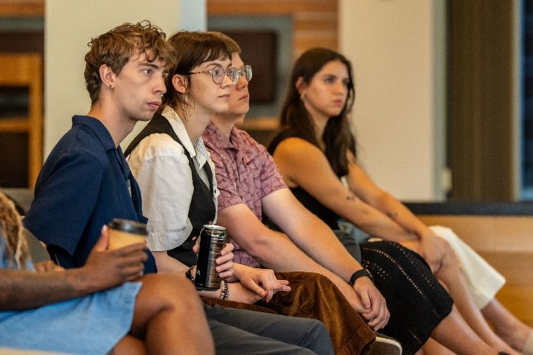 Bath & Body Works associates listening to someone speak