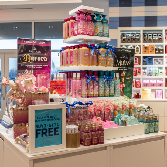 Disney Aurora and Mulan product stand in a Bath & Body Works store