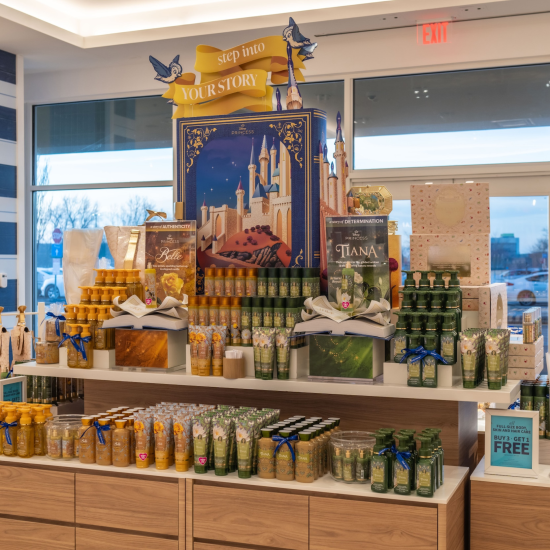 Disney Belle and Tiana products in a Bath & Body Works store