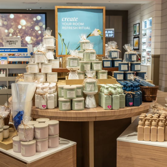 White Barn neutrals product stand in a Bath & Body Works store
